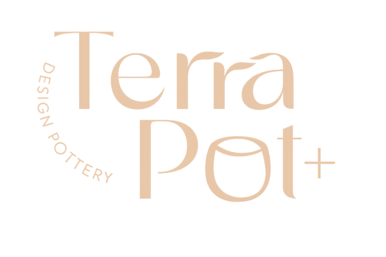 Glowing sign reading 'Terra Pot' with vertical 'Design Pottery' text along the left edge, soft amber glow on dark background.